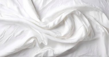 Lüks beyaz kumaş dokusunun yakın çekimi. Afişler, posterler ve duvar kağıtları için en iyi illüstratör fotoğrafları.