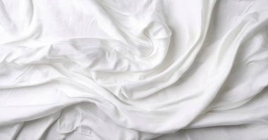 Yumuşak kırışıklıkları olan ipeksi beyaz bir madde. Malzeme amaçlı temiz modern illüstrasyon fotoğrafı.