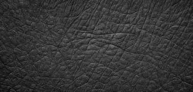 Hasarlı duvar dokusu ve çok güzel detayları olan siyah kaliteli bir arka plan. Karmaşık çizgileri olan buruşuk siyah yüzey.