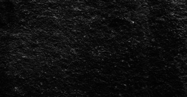 Dokulu arka plan ve doğal çizgi oluşumları. Pankart ve poster arkaplanı için klasik retro ve zarif siyah kaya duvarının eski fotoğrafı.