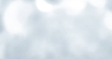 Huzurlu ve minimum gri arkaplan ışıkla serpiştirilmiş. Parlak ve parlak renklerle yumuşak detaylarla modern bulanık bokeh arkaplan.