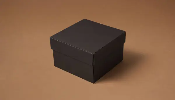 stock image A closed square black gift box sits on a brown surface. Premium photo mockup for elegant and clean cardboard box product.