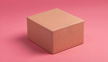 Kahverengi karton kutu parlak pembe bir arka planda duruyor. Zarif ve temiz karton kutu ürünü için kaliteli fotoğraf modeli.