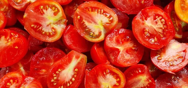 stock image Vibrant close-up of halved tomatoes, showcasing their fresh, organic, and irresistibly juicy nature. A captivating illustration of appetizing, farm-fresh vegetables