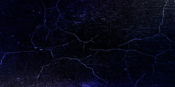 Dark blue grunge background. Concrete wall texture with cracks, large and small grain scratches and damage. Desktop design, website banner. Big, wide, rough colorful, bright distress template, pattern