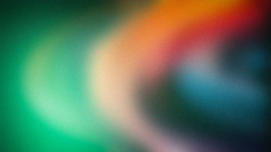 Yeşil, turuncu ve mavi renklerin harmanlanmış harmonik karışımına sahip, kumlu bir dokuya sahip canlı 4K gradyan. Canlı arka planlar, duvar kağıtları ve dijital afişler için mükemmel.