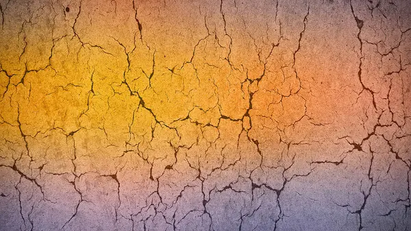 stock image Golden-orange cracked earth texture in high resolution, perfect for 4K backgrounds, adding warmth and a natural, earthy tone to your designs and presentations