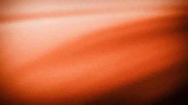 stock image A smooth orange gradient with a grainy texture, transitioning from light orange to deep, warm hues. Ideal for use in modern designs, backgrounds, and digital wallpapers