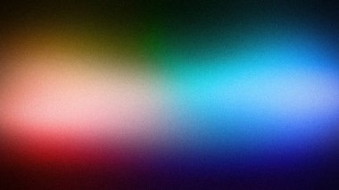 Kırmızı, pembe, yeşil ve mavi renklerin cesur bir karışımından oluşan canlı soyut bir gradyan arka plan. Kumlu doku derinlik ekler, dinamik dijital arkaplan ve duvar kağıtları için ideal hale getirir.