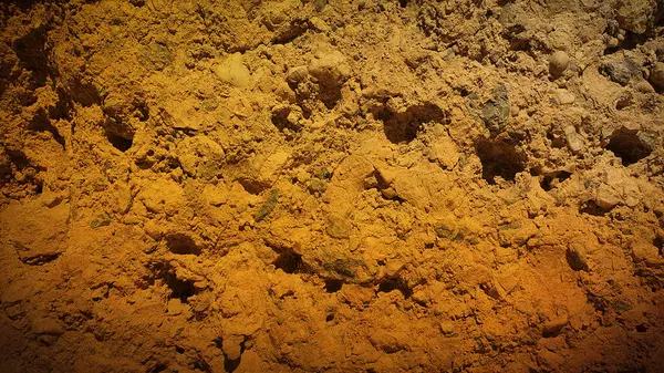 Turuncu ve sarı tonlarda sıcacık desenli arka plan doğal taş detaylarıyla, yaratıcı tasarımlar ve dijital sanat projeleri için mükemmel.