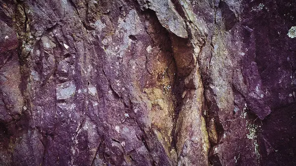 stock image Textured 4K image of rugged stone in shades of purple, brown, and gray, offering a natural, grainy surface perfect for backgrounds, banners, and creative designs