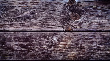 Kırsal ahşap doku, mor ve kahverengi tonların karışımı, doğal tahıl desenleri ve yıpranmış çatlaklar, dengesiz ve yaratıcı arka planlar için ideal.