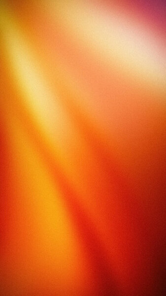 A vertical abstract gradient showcasing vivid shades of orange, yellow, and red with a grainy texture. Ideal for dynamic backgrounds, wallpapers, and banners