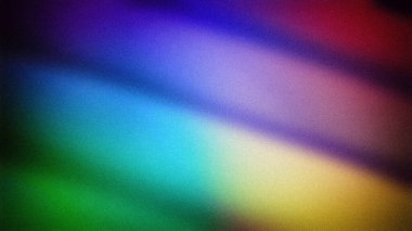 Mavi, yeşil, sarı ve kırmızı renklerin pürüzsüz geçişlerini içeren canlı soyut bir gradyan, kumlu bir dokuya sahip. Dinamik dijital arkaplanlar, duvar kağıtları ve yaratıcı projeler için ideal