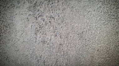 Kalıplı taş duvar zemininde doğal gri ve beyaz tonlarda sert beton benzeri bir yüzey var. Endüstriyel tasarım, web sayfaları ve yaratıcı projeler için ideal