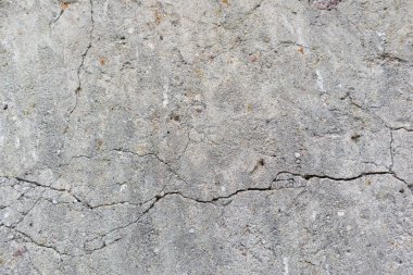 gri kırık beton duvar.
