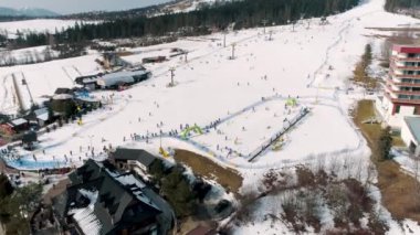 Winter Aerial view on the ski lift in Zakopane. Polana szymoszkowa. High quality 4k footage