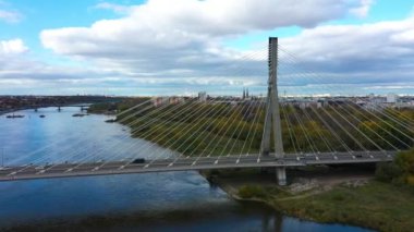 Aerial View of Swietokrzyski Bridge over the Vistula river in Warsaw, Poland. High quality 4k footage