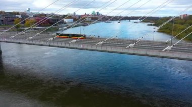 Aerial View of Swietokrzyski Bridge over the Vistula river in Warsaw, Poland. High quality 4k footage
