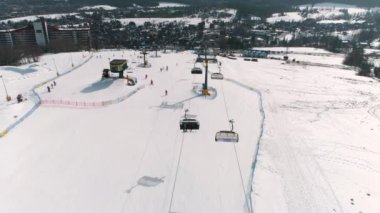 Winter Aerial view on the ski lift in Zakopane. Polana szymoszkowa. High quality 4k footage