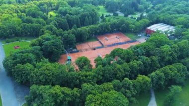 Aerial view of tennis courts in Park Poniatowskiego in Lodz. High quality 4k footage