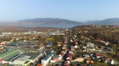 Frozen Lake And Panorama Of Zywiec Aerial View. High quality 4k footage