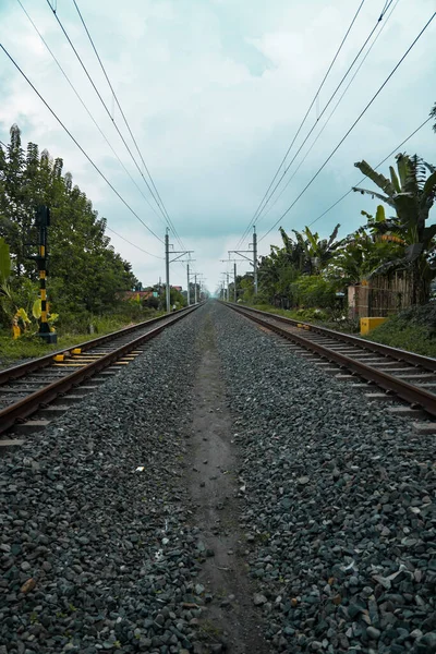 Detail Railroad Tracks Made Iron Wood Gravel Suburban Area Cloudy — Stock Photo, Image