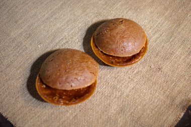 Round organic palm sugar traditionally processed by rural communities in Indonesia, photographed in the kitchen of one of the villagers
