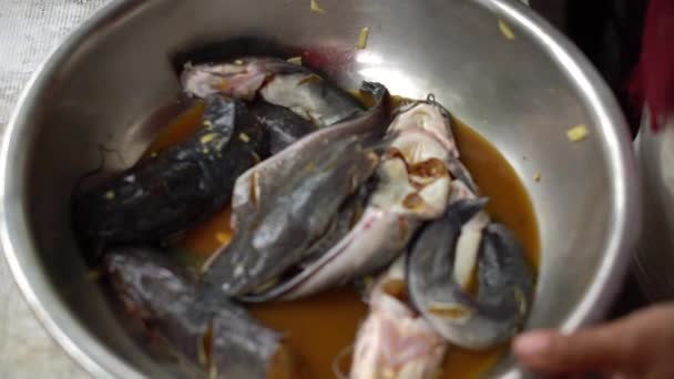 Asian Woman Hands Process Frying Catfish Has Been Seasoned Put — Stockvideo