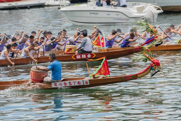 Stock image ABERDEEN-HONG KONG,22 JUNE 2023: Boats racing in the Love River for the Dragon Boat Festival in Aberdeen Hong Kong