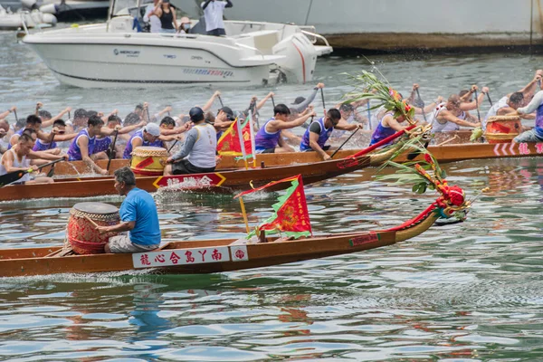 stock image ABERDEEN-HONG KONG,22 JUNE 2023: Boats racing in the Love River for the Dragon Boat Festival in Aberdeen Hong Kong