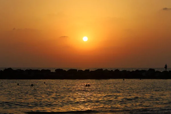 stock image The sun goes below the horizon on the Mediterranean Sea.