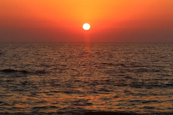 stock image The sun goes below the horizon on the Mediterranean Sea.