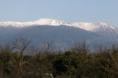 Snow lies on the top of Mount Hermon