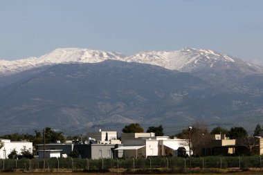Snow lies on the top of Mount Hermon