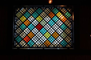 True sunlight and artificial lighting. Abstract photo of light and dark.