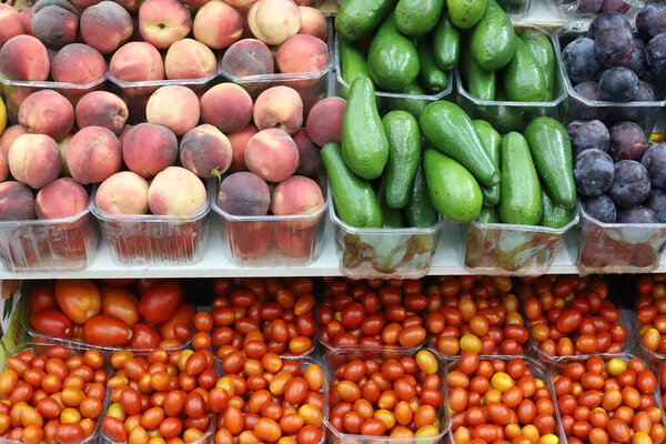 Fresh vegetables and fruits are sold at a market in Israel