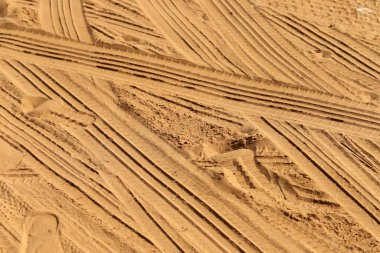 Footprints in the sand on the shores of the Mediterranean Sea.