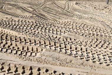 Footprints in the sand on the shores of the Mediterranean Sea.