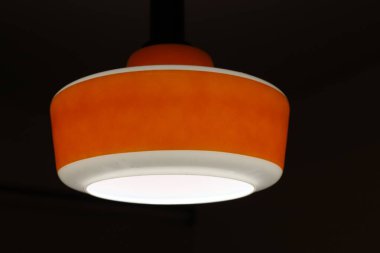 A lamp for illuminating a room at night.