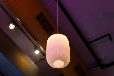 A lamp for illuminating a room at night.