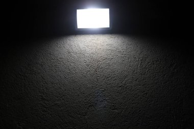 A lamp for illuminating a room at night.