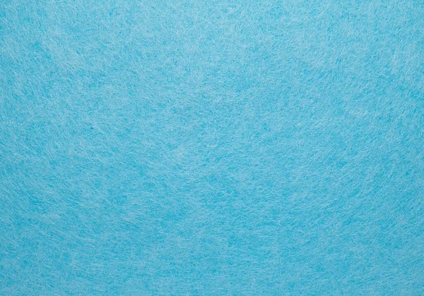 概要白い繊維のクモの巣に覆われた青い背景 — ストック写真