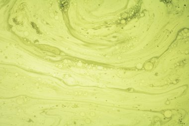 Bulanık ile soyut eğimli yeşil dalgalı arkaplan.