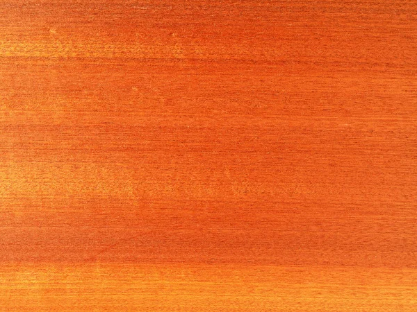 桃花心木面板上明亮的木制背景 — 图库照片