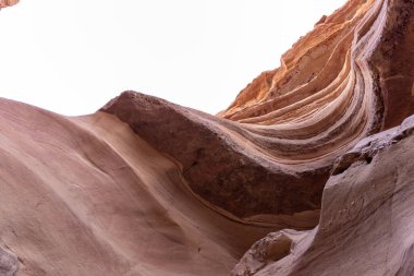 Fantastically beautiful landscape in the national nature reserve - Red Canyon in the rays of the setting sun, near the city of Eilat, in southern Israel