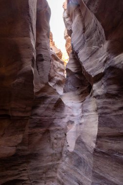 Fantastically beautiful landscape in the national nature reserve - Red Canyon in the rays of the setting sun, near the city of Eilat, in southern Israel