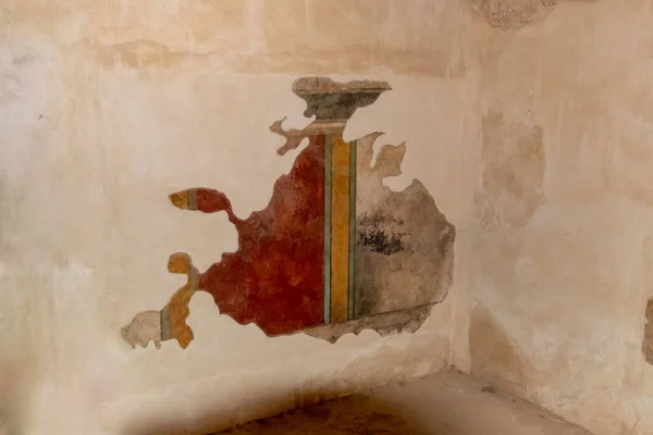 Remains of paintings on the walls of internal buildings in the ruins of the Masada - is a fortress built by Herod the Great on a cliff-top off the coast of the Dead Sea, in southern Israel