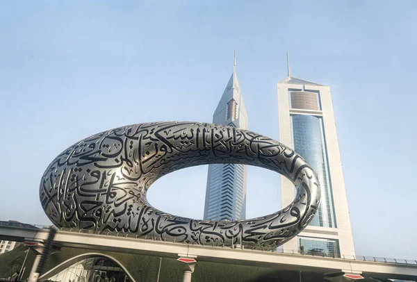 stock image Dubai, United Arab Emirates, March 16, 2023 : View from the window of a tourist bus to the Museum of The Future and the Jumeirah Emirates Towers in Dubai city, United Arab Emirates