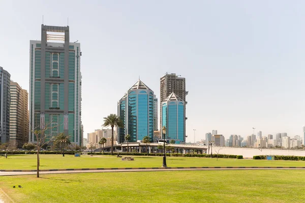 stock image Sharjah, United Arab Emirates, March 17, 2023 : View from the Al Ittihad Park to the architecture of the surrounding residential areas in Sharjah city, United Arab Emirates